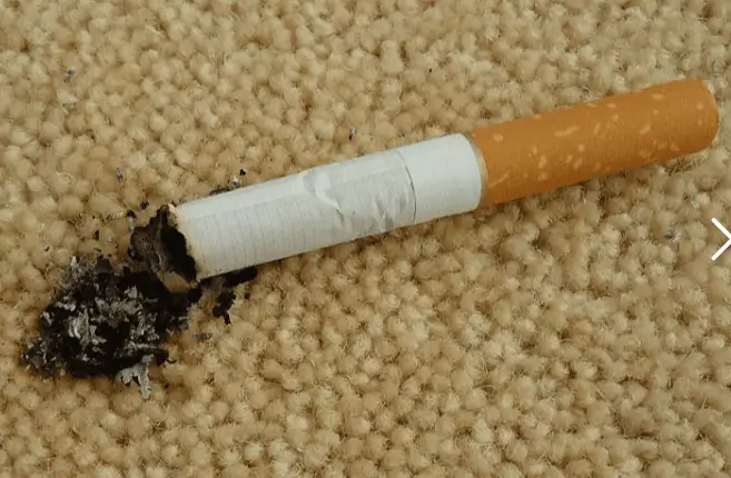 cigarette burn on carpet